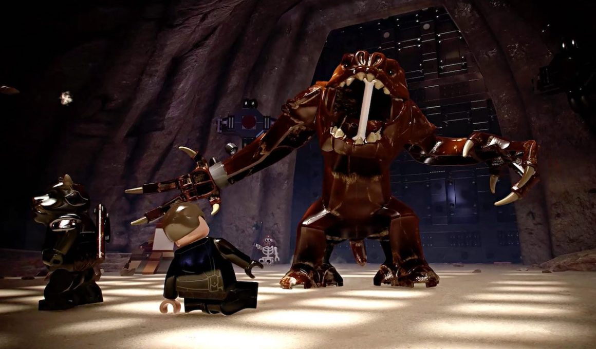 A screenshot that shows Luke Skywalker and the Rancor in LEGO Star Wars: The Skywalker Saga